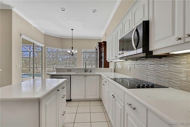 Beautifully upgraded home with 4 bedrooms, 2.5 baths and a 3 car on Southern Woods Golf Club in Florida - for sale on GolfHomes.com, golf home, golf lot