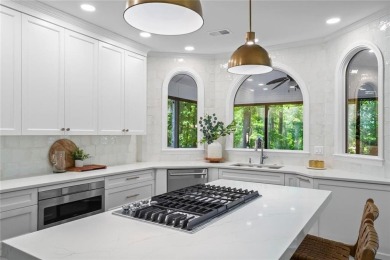 Nestled in the heart of Alpharetta this renovated home in on The Golf Club of Georgia in Georgia - for sale on GolfHomes.com, golf home, golf lot