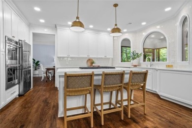 Nestled in the heart of Alpharetta this renovated home in on The Golf Club of Georgia in Georgia - for sale on GolfHomes.com, golf home, golf lot