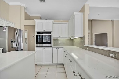 Beautifully upgraded home with 4 bedrooms, 2.5 baths and a 3 car on Southern Woods Golf Club in Florida - for sale on GolfHomes.com, golf home, golf lot