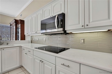 Beautifully upgraded home with 4 bedrooms, 2.5 baths and a 3 car on Southern Woods Golf Club in Florida - for sale on GolfHomes.com, golf home, golf lot