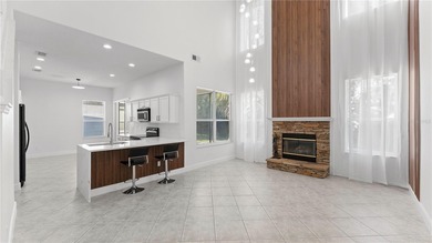 PRICED TO SELL!!! - Discover this impressive, fully renovated on Oaks National Golf Course in Florida - for sale on GolfHomes.com, golf home, golf lot