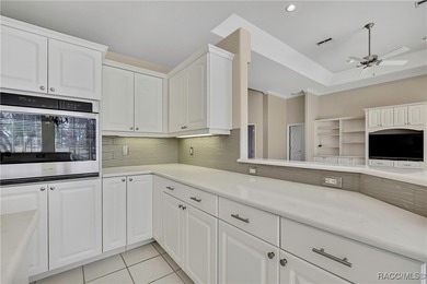 Beautifully upgraded home with 4 bedrooms, 2.5 baths and a 3 car on Southern Woods Golf Club in Florida - for sale on GolfHomes.com, golf home, golf lot
