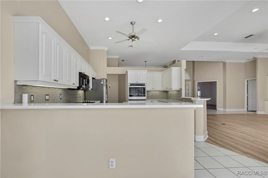 Beautifully upgraded home with 4 bedrooms, 2.5 baths and a 3 car on Southern Woods Golf Club in Florida - for sale on GolfHomes.com, golf home, golf lot