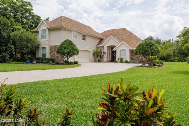 Halifax Plantation Estate home located on a large wooded lot in on Halifax Plantation Golf Club in Florida - for sale on GolfHomes.com, golf home, golf lot