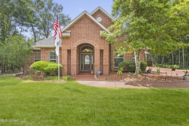 Welcome to this stunning custom-built 4-bedroom, 2.5-bath home on Diamondhead Country Club in Mississippi - for sale on GolfHomes.com, golf home, golf lot