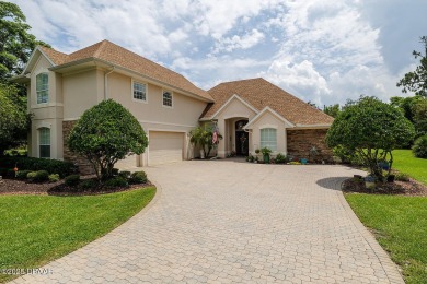 Halifax Plantation Estate home located on a large wooded lot in on Halifax Plantation Golf Club in Florida - for sale on GolfHomes.com, golf home, golf lot