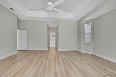 Beautifully upgraded home with 4 bedrooms, 2.5 baths and a 3 car on Southern Woods Golf Club in Florida - for sale on GolfHomes.com, golf home, golf lot