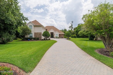Halifax Plantation Estate home located on a large wooded lot in on Halifax Plantation Golf Club in Florida - for sale on GolfHomes.com, golf home, golf lot