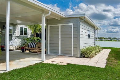 This stunning lakefront retreat in the sought-after 55+ on Imperial Lakewoods Golf Club in Florida - for sale on GolfHomes.com, golf home, golf lot