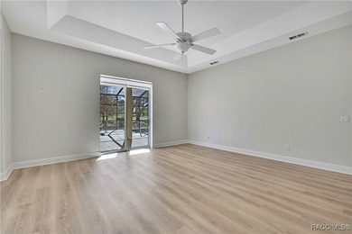 Beautifully upgraded home with 4 bedrooms, 2.5 baths and a 3 car on Southern Woods Golf Club in Florida - for sale on GolfHomes.com, golf home, golf lot