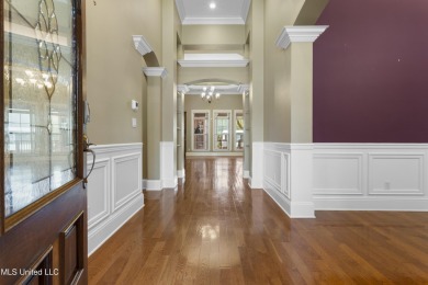 Welcome to this stunning custom-built 4-bedroom, 2.5-bath home on Diamondhead Country Club in Mississippi - for sale on GolfHomes.com, golf home, golf lot