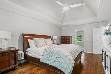 Nestled in the heart of Alpharetta this renovated home in on The Golf Club of Georgia in Georgia - for sale on GolfHomes.com, golf home, golf lot