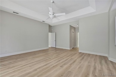 Beautifully upgraded home with 4 bedrooms, 2.5 baths and a 3 car on Southern Woods Golf Club in Florida - for sale on GolfHomes.com, golf home, golf lot