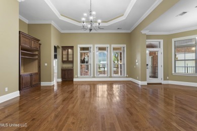Welcome to this stunning custom-built 4-bedroom, 2.5-bath home on Diamondhead Country Club in Mississippi - for sale on GolfHomes.com, golf home, golf lot