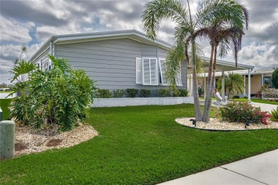 This stunning lakefront retreat in the sought-after 55+ on Imperial Lakewoods Golf Club in Florida - for sale on GolfHomes.com, golf home, golf lot