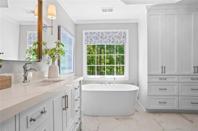 Nestled in the heart of Alpharetta this renovated home in on The Golf Club of Georgia in Georgia - for sale on GolfHomes.com, golf home, golf lot