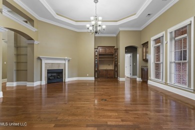 Welcome to this stunning custom-built 4-bedroom, 2.5-bath home on Diamondhead Country Club in Mississippi - for sale on GolfHomes.com, golf home, golf lot