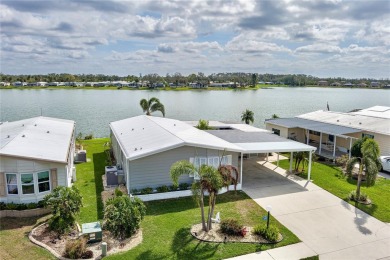 This stunning lakefront retreat in the sought-after 55+ on Imperial Lakewoods Golf Club in Florida - for sale on GolfHomes.com, golf home, golf lot