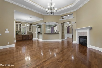 Welcome to this stunning custom-built 4-bedroom, 2.5-bath home on Diamondhead Country Club in Mississippi - for sale on GolfHomes.com, golf home, golf lot