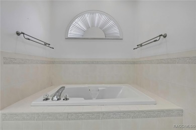 Beautifully upgraded home with 4 bedrooms, 2.5 baths and a 3 car on Southern Woods Golf Club in Florida - for sale on GolfHomes.com, golf home, golf lot