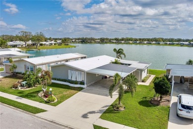 This stunning lakefront retreat in the sought-after 55+ on Imperial Lakewoods Golf Club in Florida - for sale on GolfHomes.com, golf home, golf lot