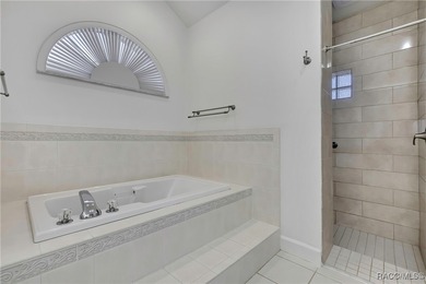 Beautifully upgraded home with 4 bedrooms, 2.5 baths and a 3 car on Southern Woods Golf Club in Florida - for sale on GolfHomes.com, golf home, golf lot