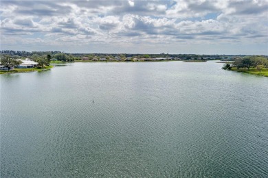 This stunning lakefront retreat in the sought-after 55+ on Imperial Lakewoods Golf Club in Florida - for sale on GolfHomes.com, golf home, golf lot