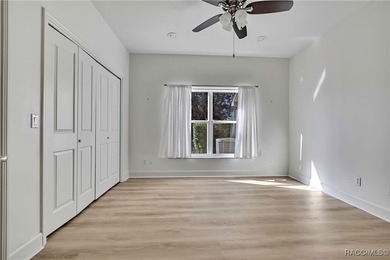 Beautifully upgraded home with 4 bedrooms, 2.5 baths and a 3 car on Southern Woods Golf Club in Florida - for sale on GolfHomes.com, golf home, golf lot