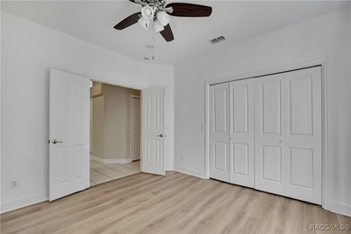 Beautifully upgraded home with 4 bedrooms, 2.5 baths and a 3 car on Southern Woods Golf Club in Florida - for sale on GolfHomes.com, golf home, golf lot