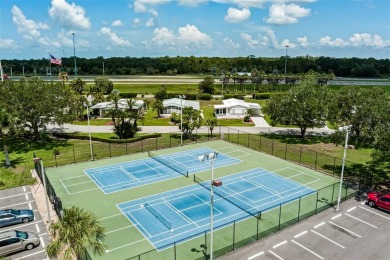 This stunning lakefront retreat in the sought-after 55+ on Imperial Lakewoods Golf Club in Florida - for sale on GolfHomes.com, golf home, golf lot