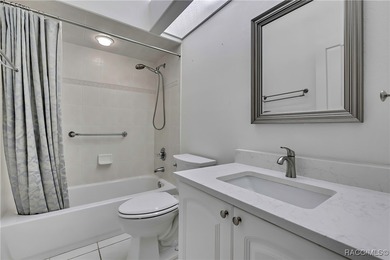 Beautifully upgraded home with 4 bedrooms, 2.5 baths and a 3 car on Southern Woods Golf Club in Florida - for sale on GolfHomes.com, golf home, golf lot