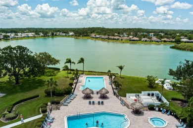 This stunning lakefront retreat in the sought-after 55+ on Imperial Lakewoods Golf Club in Florida - for sale on GolfHomes.com, golf home, golf lot