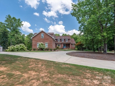 This exquisite full brick residence is set on 2.08 acres lot on Cherryville Golf and  Country Club in North Carolina - for sale on GolfHomes.com, golf home, golf lot