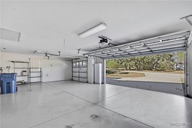 Beautifully upgraded home with 4 bedrooms, 2.5 baths and a 3 car on Southern Woods Golf Club in Florida - for sale on GolfHomes.com, golf home, golf lot