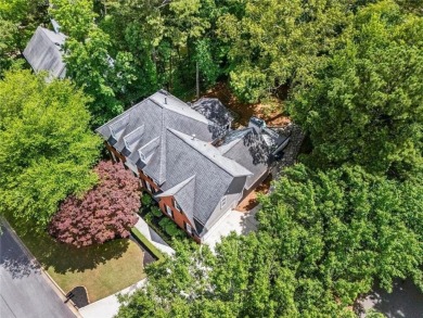 Nestled in the heart of Alpharetta this renovated home in on The Golf Club of Georgia in Georgia - for sale on GolfHomes.com, golf home, golf lot