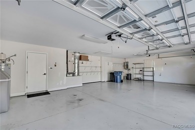 Beautifully upgraded home with 4 bedrooms, 2.5 baths and a 3 car on Southern Woods Golf Club in Florida - for sale on GolfHomes.com, golf home, golf lot