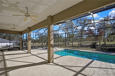 Beautifully upgraded home with 4 bedrooms, 2.5 baths and a 3 car on Southern Woods Golf Club in Florida - for sale on GolfHomes.com, golf home, golf lot