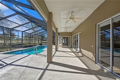 Beautifully upgraded home with 4 bedrooms, 2.5 baths and a 3 car on Southern Woods Golf Club in Florida - for sale on GolfHomes.com, golf home, golf lot
