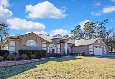 Beautifully upgraded home with 4 bedrooms, 2.5 baths and a 3 car on Southern Woods Golf Club in Florida - for sale on GolfHomes.com, golf home, golf lot