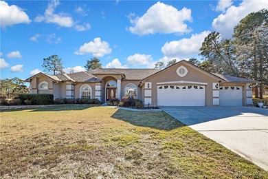 Beautifully upgraded home with 4 bedrooms, 2.5 baths and a 3 car on Southern Woods Golf Club in Florida - for sale on GolfHomes.com, golf home, golf lot