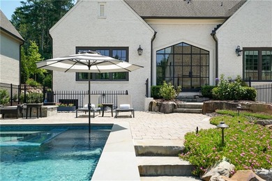 Perfectly positioned on the 1st fairway of The Manor Golf & on Manor Golf and Country Club in Georgia - for sale on GolfHomes.com, golf home, golf lot