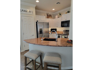 WELCOME HOME! This STUNNING, bright and open concept floor plan on Poston Butte Golf Club in Arizona - for sale on GolfHomes.com, golf home, golf lot