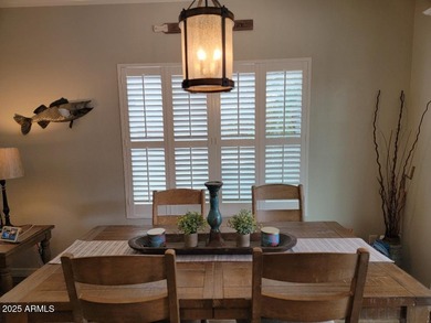 WELCOME HOME! This STUNNING, bright and open concept floor plan on Poston Butte Golf Club in Arizona - for sale on GolfHomes.com, golf home, golf lot