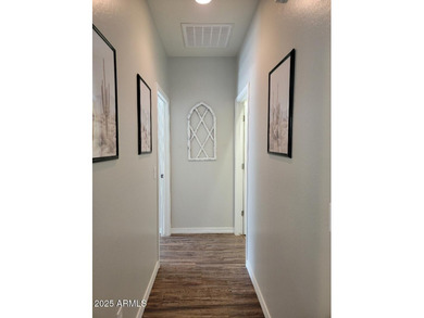 WELCOME HOME! This STUNNING, bright and open concept floor plan on Poston Butte Golf Club in Arizona - for sale on GolfHomes.com, golf home, golf lot