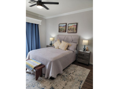 WELCOME HOME! This STUNNING, bright and open concept floor plan on Poston Butte Golf Club in Arizona - for sale on GolfHomes.com, golf home, golf lot