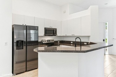 TREMENDOUS OPPORTUNITY FOR THIS COZY 2BR+DEN, 2 BA VILLA on Ibis Golf and Country Club in Florida - for sale on GolfHomes.com, golf home, golf lot