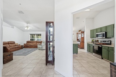 Beautiful and well-maintained 4-bedroom, 2-bath home located in on Grand Club Matanzas in Florida - for sale on GolfHomes.com, golf home, golf lot