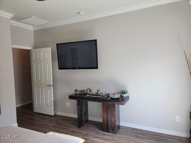WELCOME HOME! This STUNNING, bright and open concept floor plan on Poston Butte Golf Club in Arizona - for sale on GolfHomes.com, golf home, golf lot