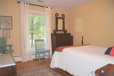 Tucked in a friendly, private neighborhood, this beautifully on Hanover Country Club in Virginia - for sale on GolfHomes.com, golf home, golf lot